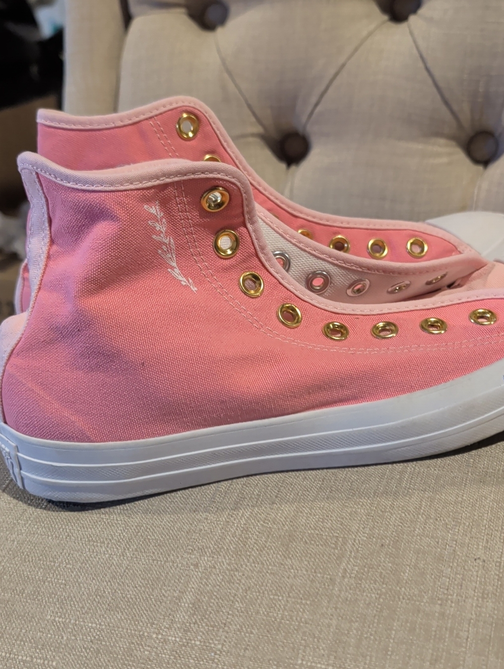 Converse Pink High-Top Canvas Sneakers with Gold Eyelets